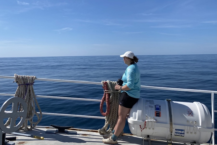 Abby Lucas on a boat by the sea