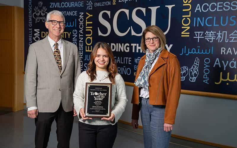 English Professor Andrew Smyth; Alejandra Quiñones, '25; and English Professor Melissa Talhelm