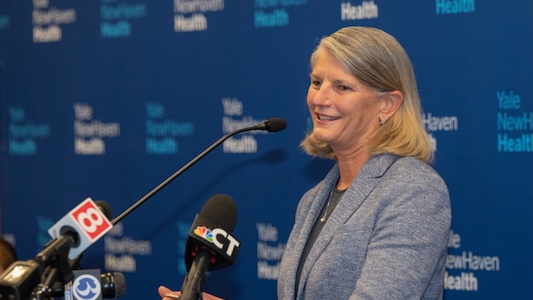 Sandra Bulmer speaking with the press