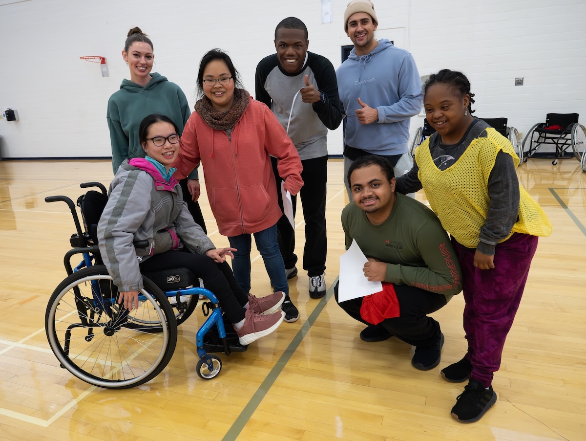 Group of young people with one person in a wheelchair