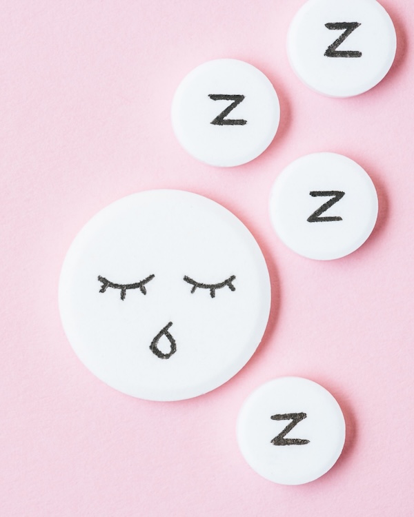 3D rendering of a round sleep face and z's